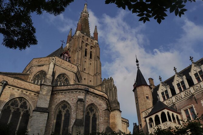Across Bruges History Equals Fun with chocolate and waffle sample - The Fish Market and the old leather trade