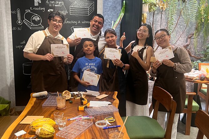 Bean to bar Chocolate Workshop in Ho Chi Minh City - Husking beans and using a granite mortar
