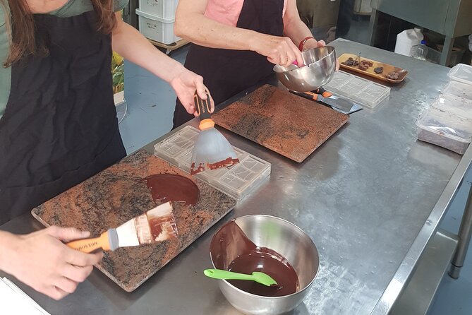 Become a Chocolate Master! Chocolate Bar Workshop in Paris - Filling molds and adding toppings