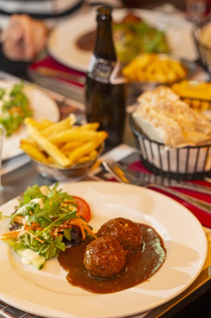 Brussels Food Tour: Main Dish, Beer, Waffle & Chocolate - Boulette and Belgian fries: the filling center of the tour