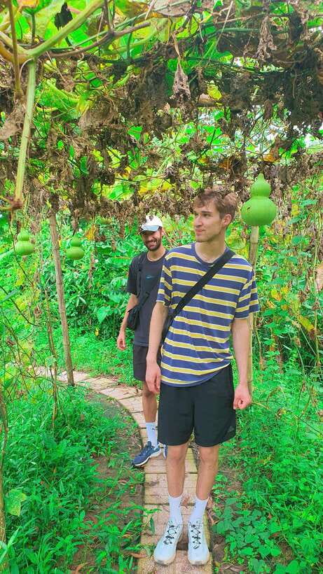 Can Tho: Countryside Cycling Tour with Cocoa Farm Visit - Crossing the river by ferry