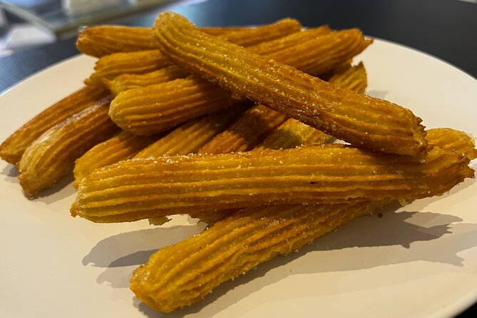 Chocolate & Churros Cooking Class in Madrid - Preparing the chocolate for dipping