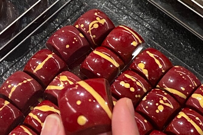 Ghent: Famous Belgian Chocolate Walking Tour with Tastings - Chocolaterie Van Hoorebeke and the passion-fruit surprise
