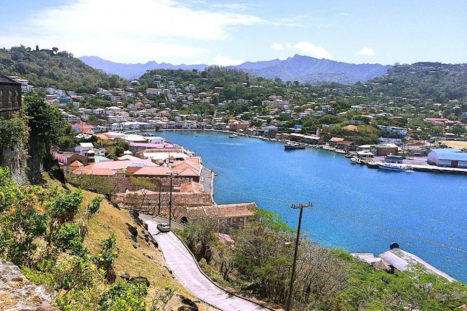 Grenada West Coast: Waterfalls, Chocolate & Rum Half-Day Tour - River Antoine Estate: old machinery and strong rum