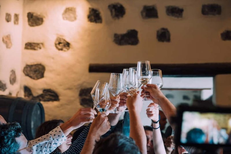 Lanzarote: Sunset vineyard tour with wine and chocolate tasting - The house, cistern, and old winery