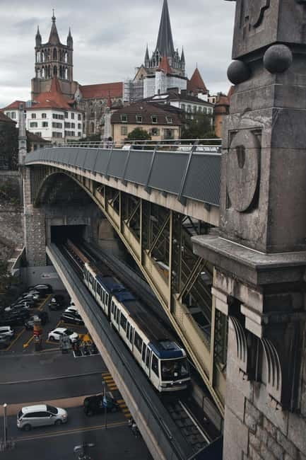 Lausanne: Walking Tour with Chocolate Tastings & Metro - Notre-Dame Cathedral and the covered market stairway