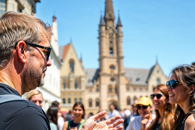 Secrets of Bruges: Walking Tour With a Chocolate and Waffle Bite - Belfort Tower and the first view of Market Square