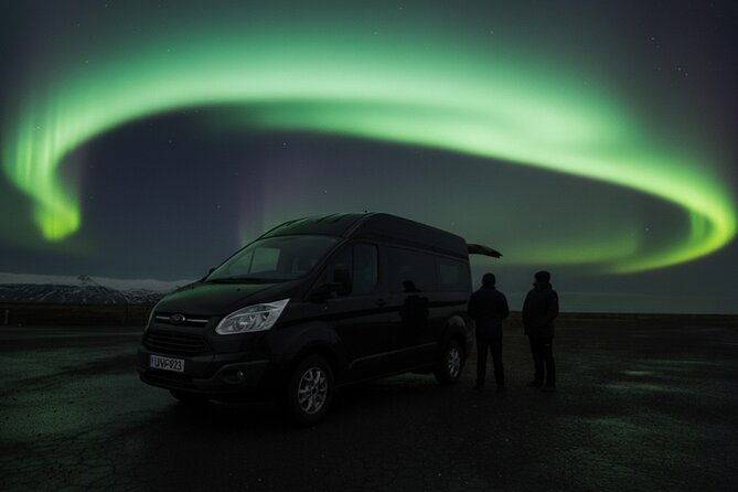 Small-Group Tour: Northern Lights with Photos & Hot Chocolate - Leaving Reykjavik behind in a compact Sprinter
