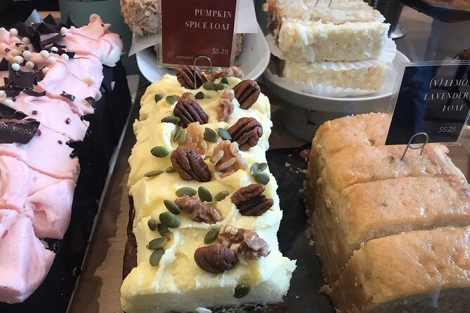 Vancouver Food Tour with 6 Tastings of Sushi, Chocolate, and more - The Olympic torch and downtown sights